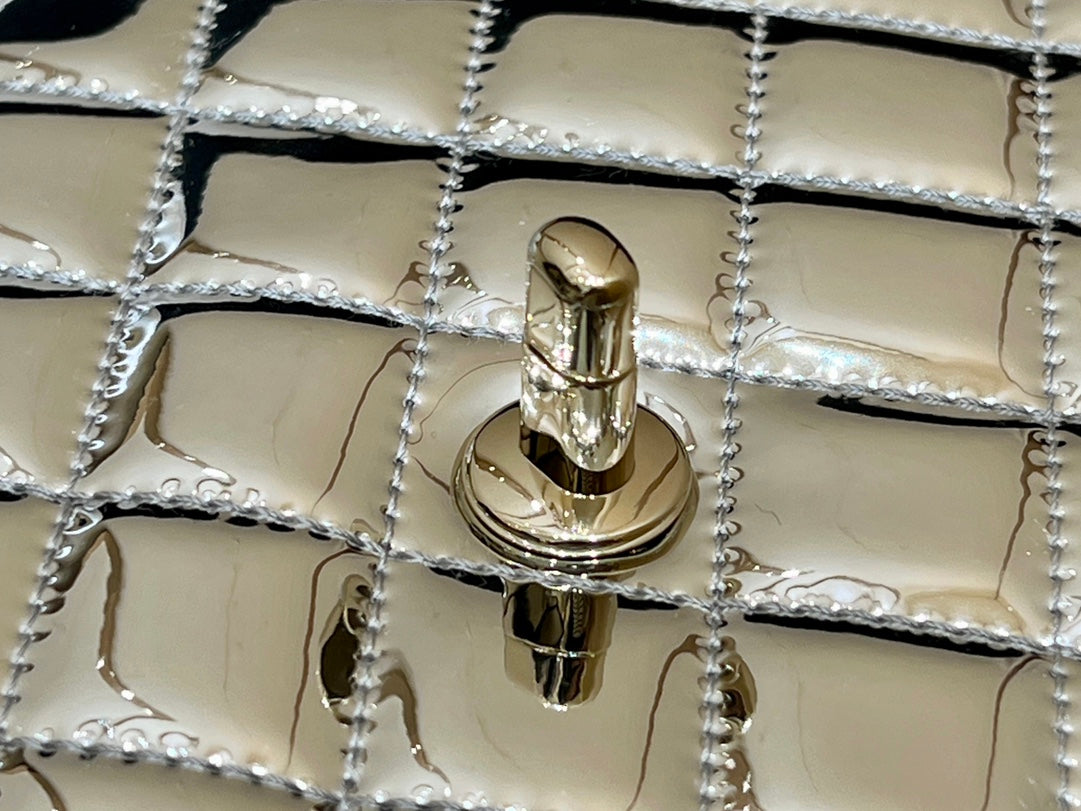 CHANEL 25S  STAR SILVER 23 IN METALLIC SILVER CALFSKIN