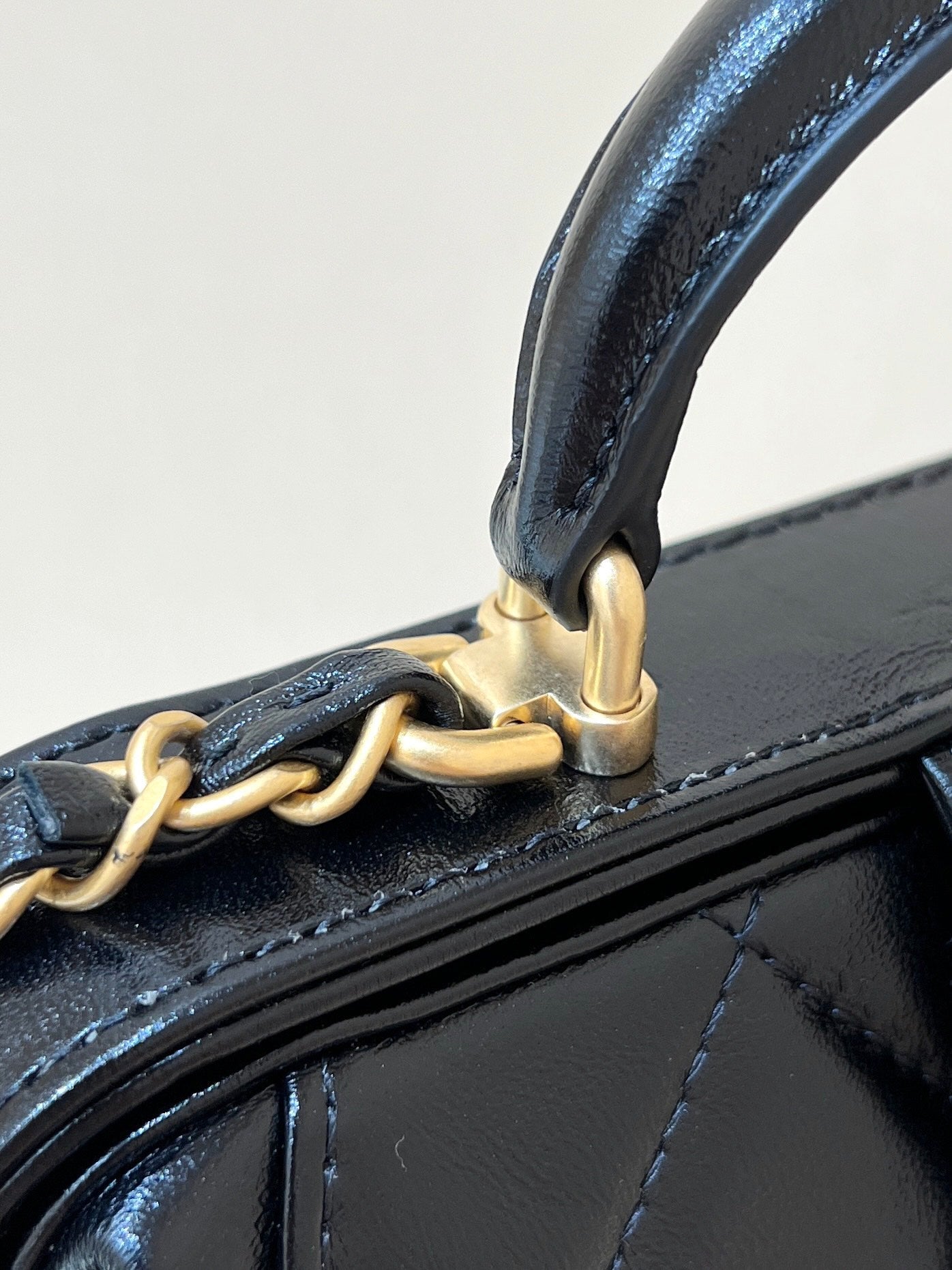 CHANEL MEDIUM TOP HANDLE BAG 23 IN BLACK OIL-WAX LAMBSKIN GOLD HARDWARE