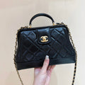 CHANEL MEDIUM TOP HANDLE BAG 23 IN BLACK OIL-WAX LAMBSKIN GOLD HARDWARE