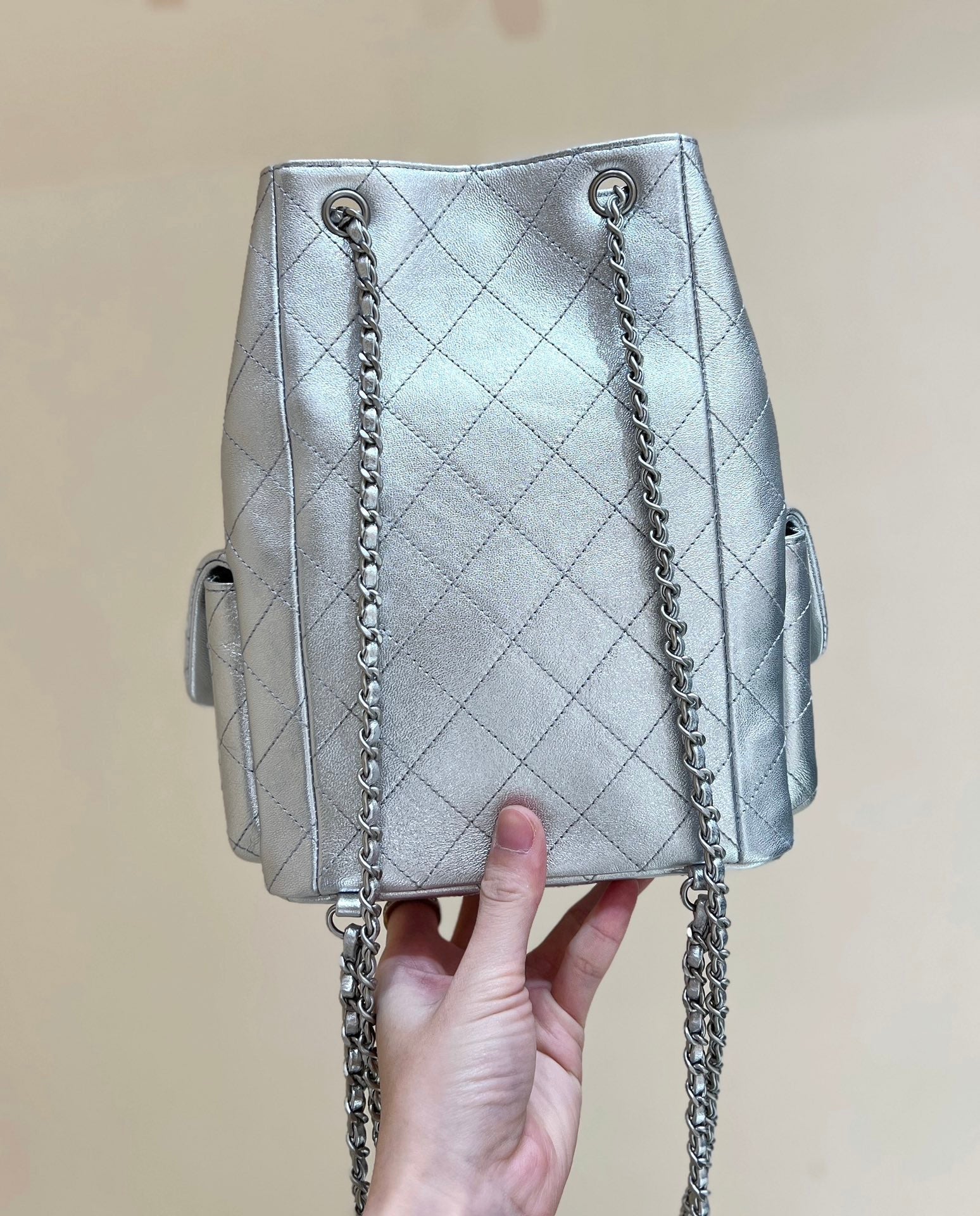 CHANEL DRAWSTRING BUCKET BACKPACK 24 IN SILVER-TONE LAMBSKIN SILVER HARDWARE