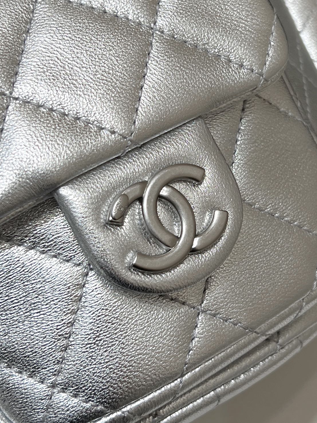 CHANEL DRAWSTRING BUCKET BACKPACK 24 IN SILVER-TONE LAMBSKIN SILVER HARDWARE