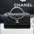 CHANEL FLAP BAG WITH SILVER-TONE HANDLE 18 IN BLACK LAMBSKIN