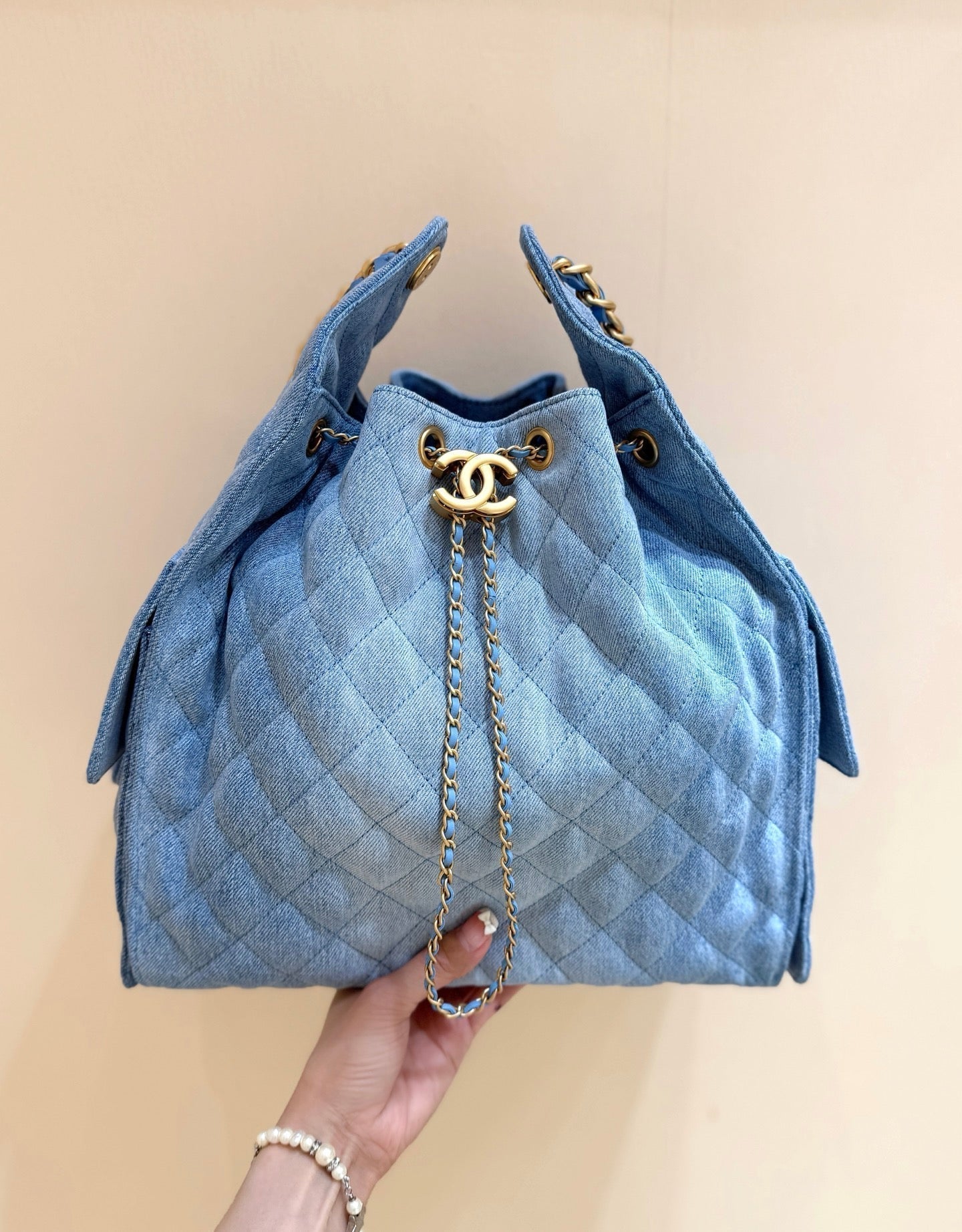 CHANEL 25 HANDBAG 40 IN BLUE DENIM GOLD HARDWARE