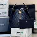 CHANEL 25 HANDBAG 40 IN DARK BLUE DENIM GOLD HARDWARE