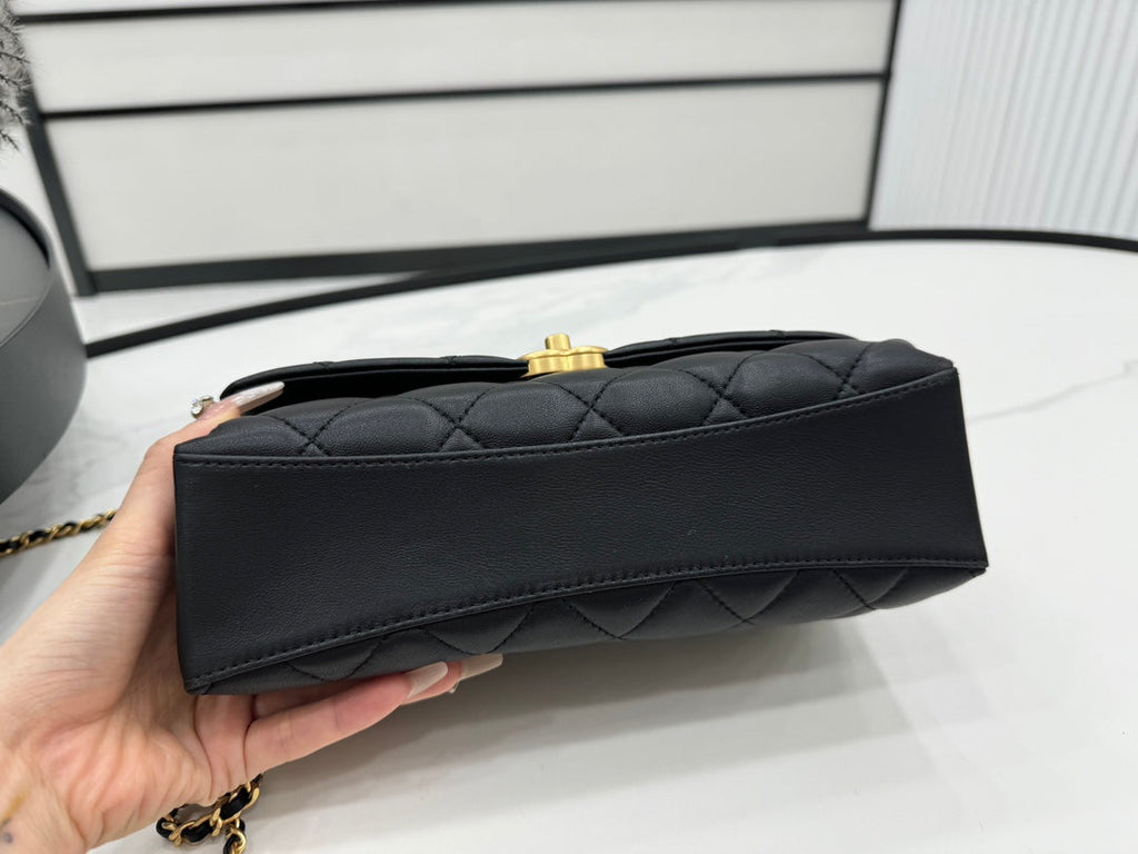 CHANEL 25S FLAP BAG 23 CM IN BLACK LAMBSKIN WITH PEARL TOP HANDLE