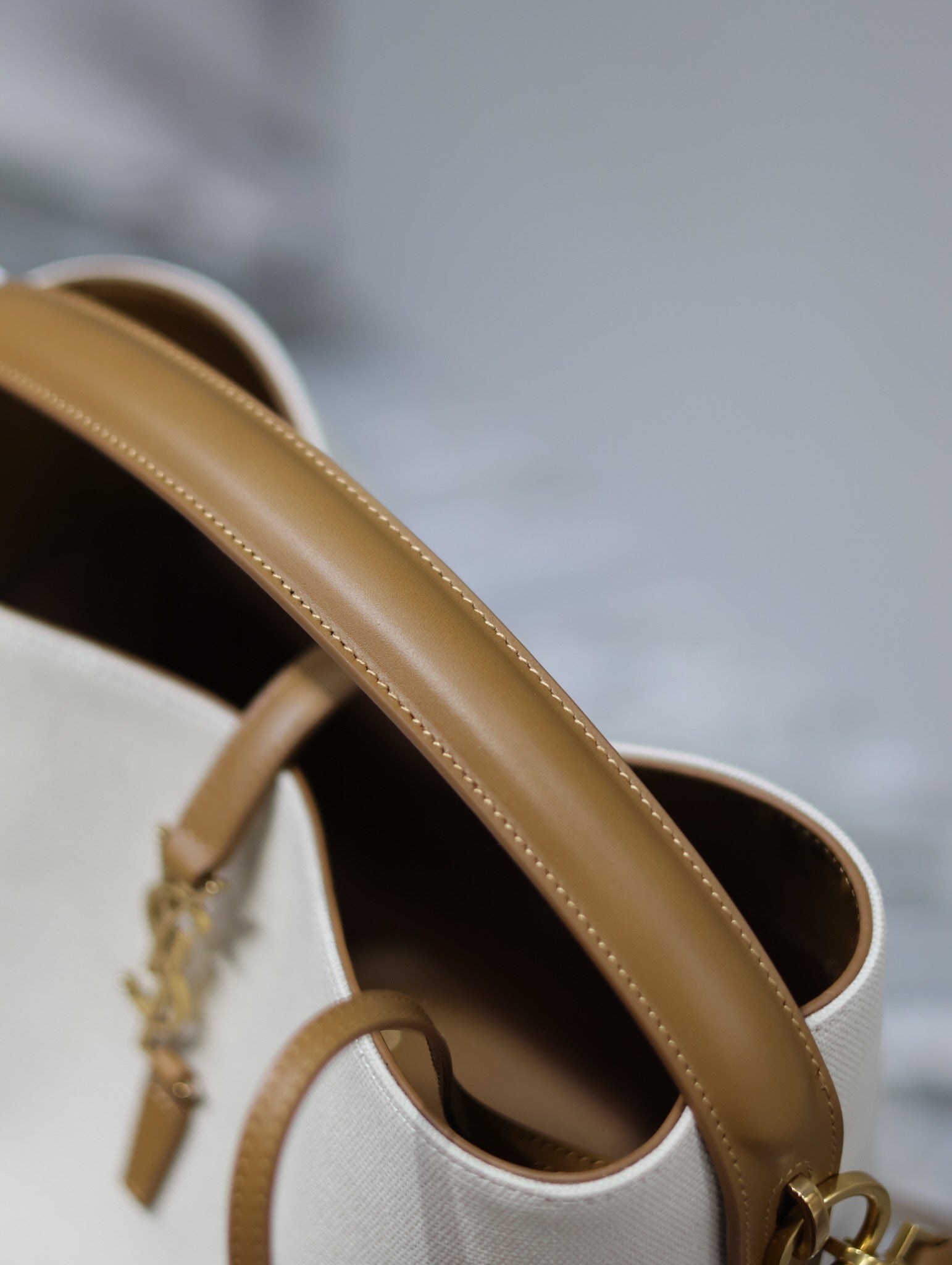 YSL 25S LE 5 À 7 BUCKET 26 IN CREAM BROWN CALFSKIN AND CANVAS GOLD HARDWRE