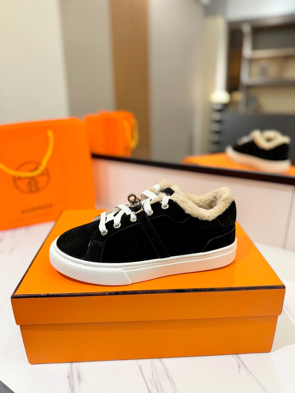 HERMES DAY SNEAKER IN BLACK SUEDE AND FLEECE LINING