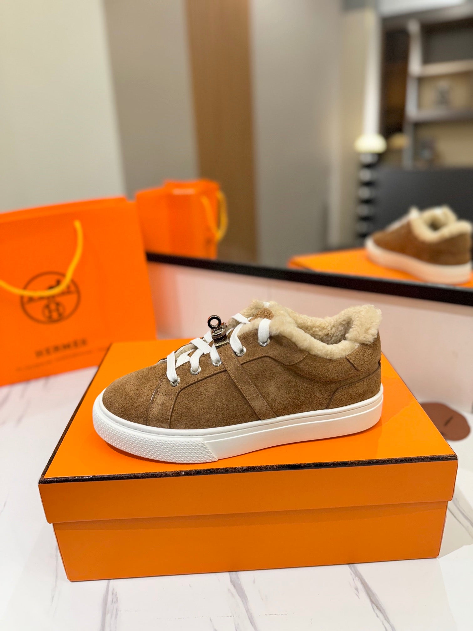 HERMES DAY SNEAKER IN BRONZE BROWN SUEDE AND FLEECE LINING