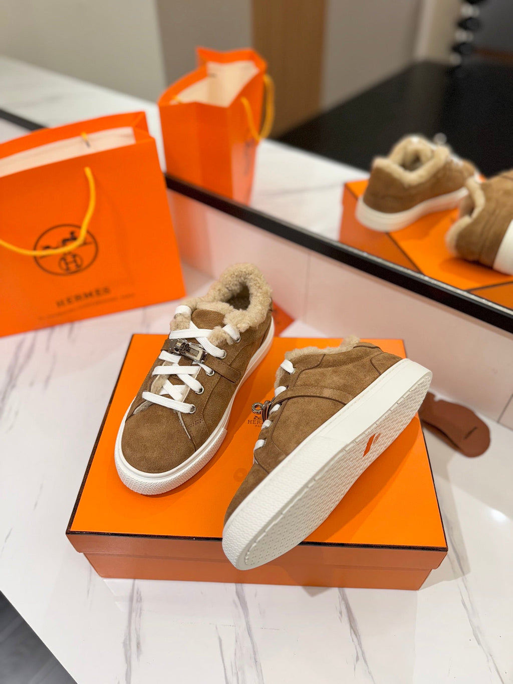 HERMES DAY SNEAKER IN BRONZE BROWN SUEDE AND FLEECE LINING