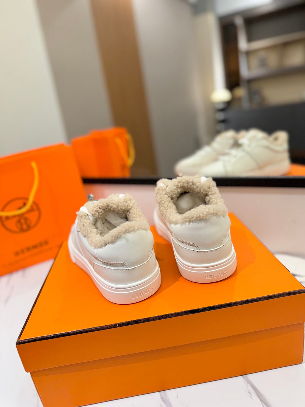 HERMES DAY SNEAKER IN WHITE CALFSKIN AND FLEECE LINING