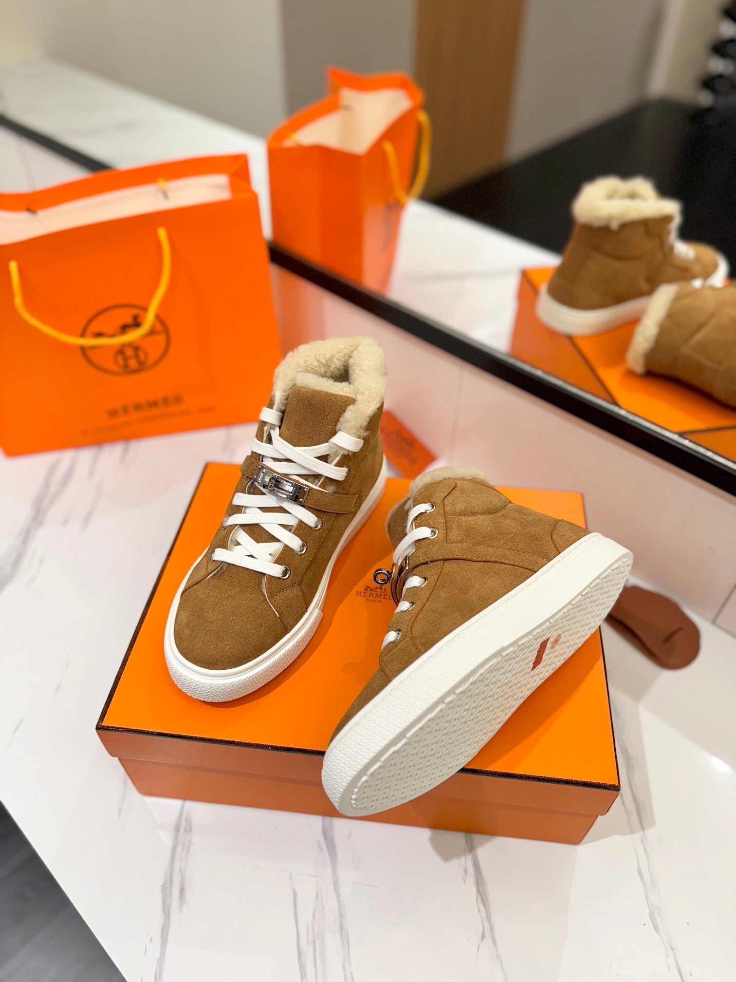 HERMES CHEALSEA BOOTS IN BRONZE BROWN SUEDE AND FLEECE LINING