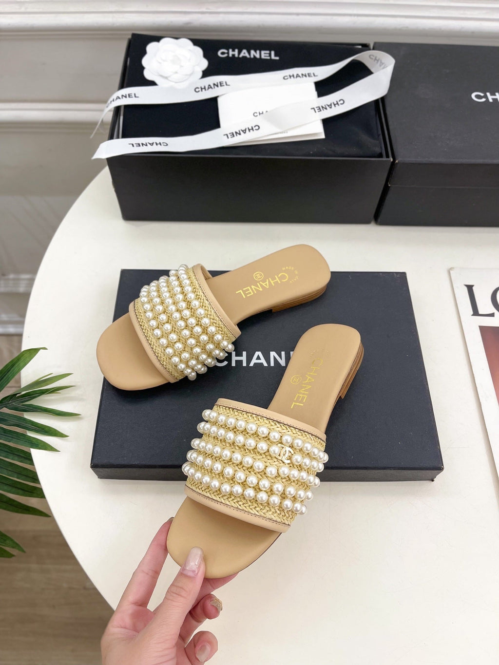CHANEL FLAT SLIDE IN FLAX YELLOW CALFSKIN WITH PEARLS