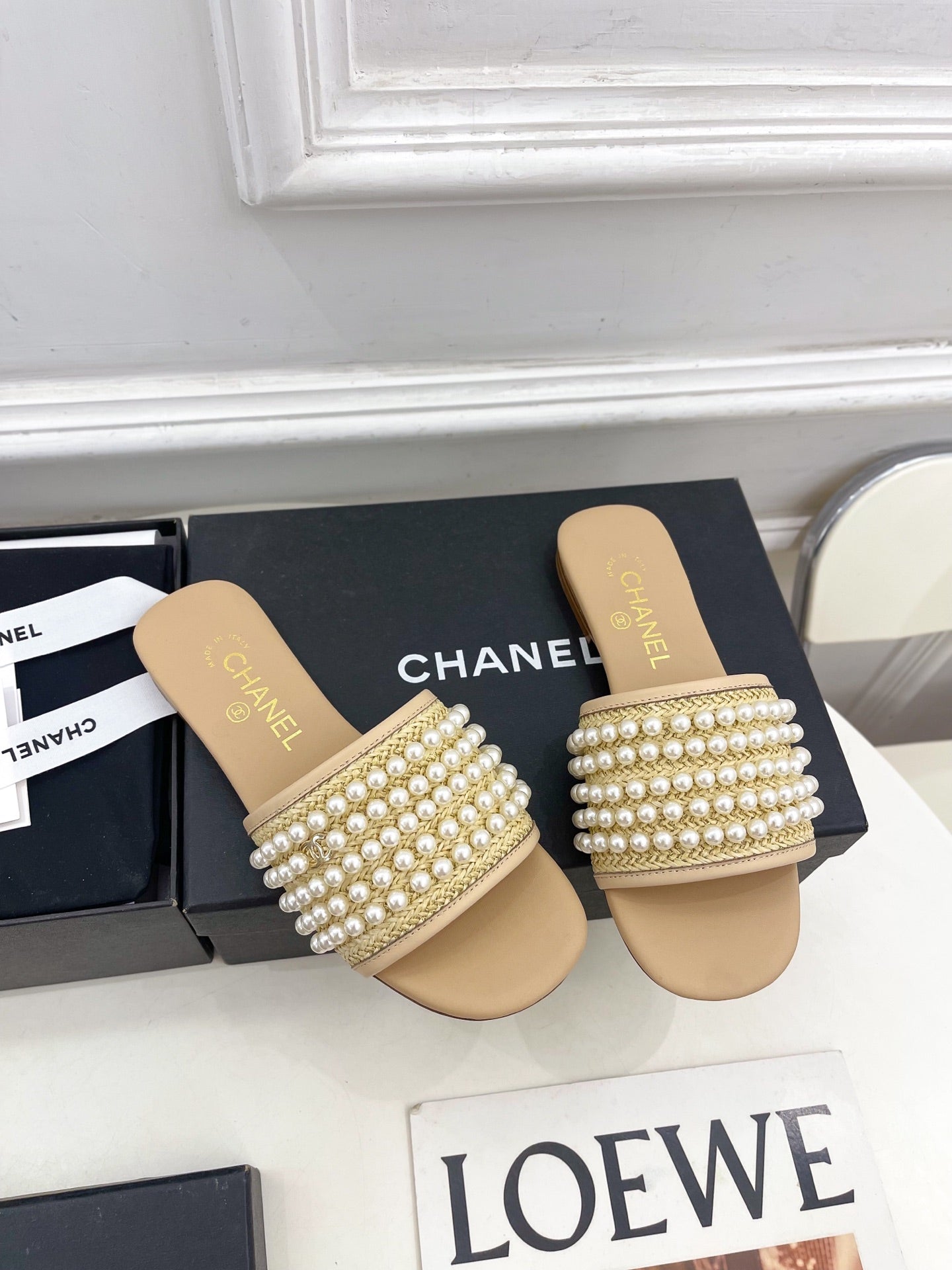 CHANEL FLAT SLIDE IN FLAX YELLOW CALFSKIN WITH PEARLS